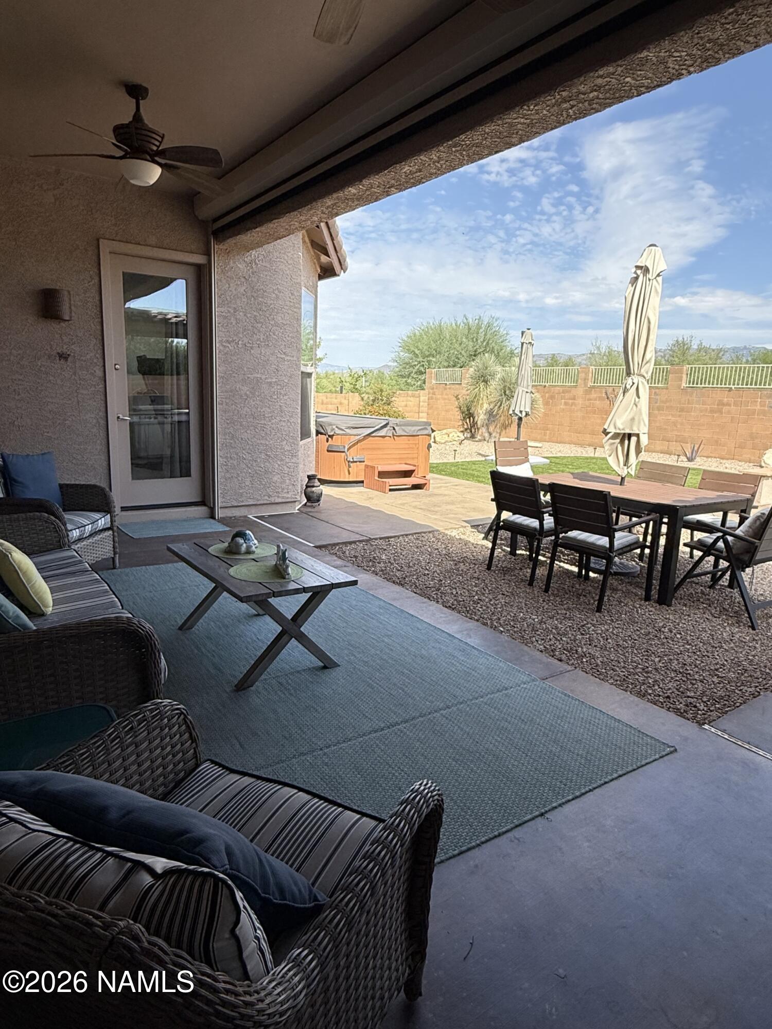 9587 South Via Bandera Vail, AZ 85641 - Photo 23 of 28 a living room with furniture and a large window