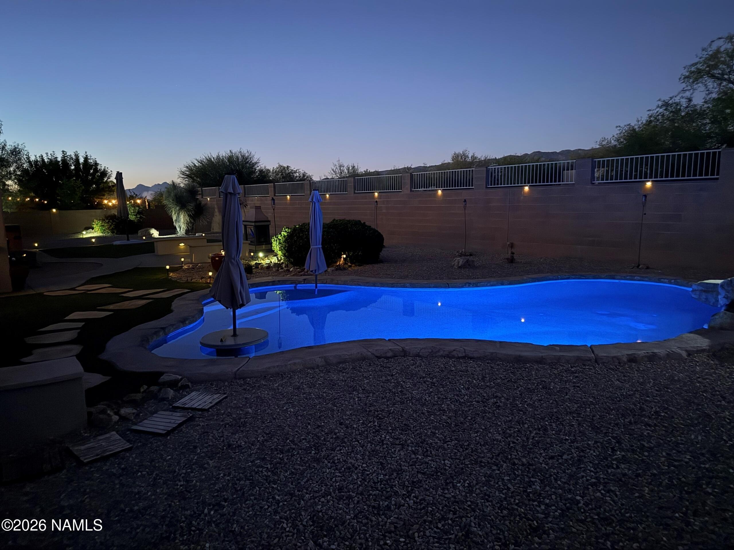 9587 South Via Bandera Vail, AZ 85641 - Photo 24 of 28 a view of a backyard with golf course