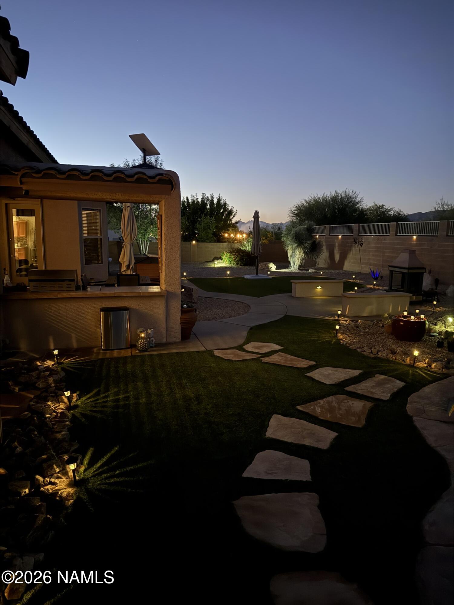 9587 South Via Bandera Vail, AZ 85641 - Photo 28 of 28 a front view of a house with garden