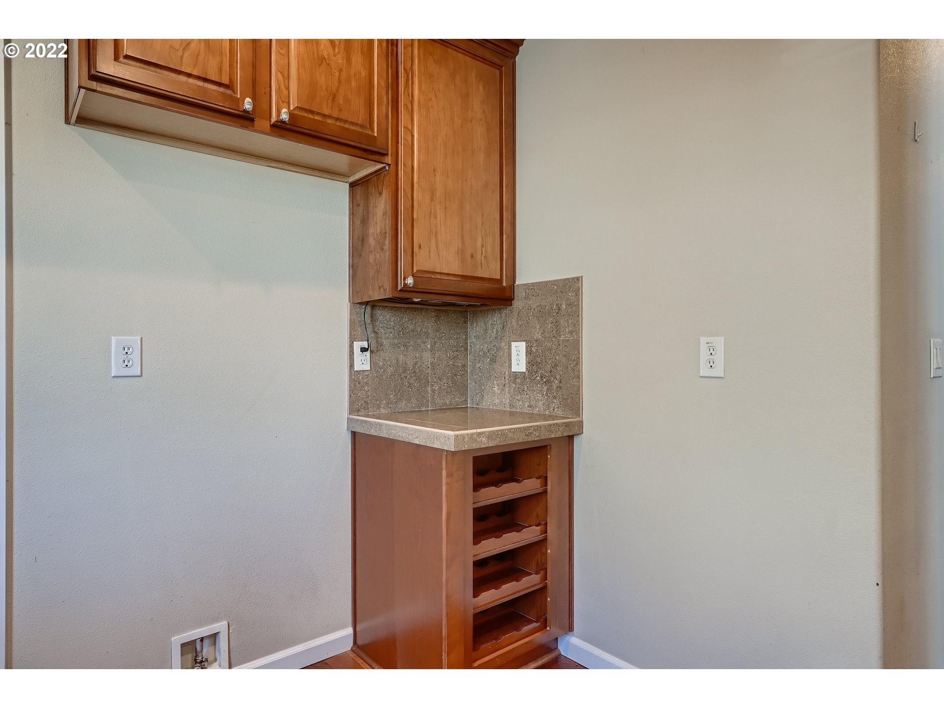 1652 South 15th Way Ridgefield, WA 98642 - Photo 15 of 32 a kitchen with a sink and cabinets