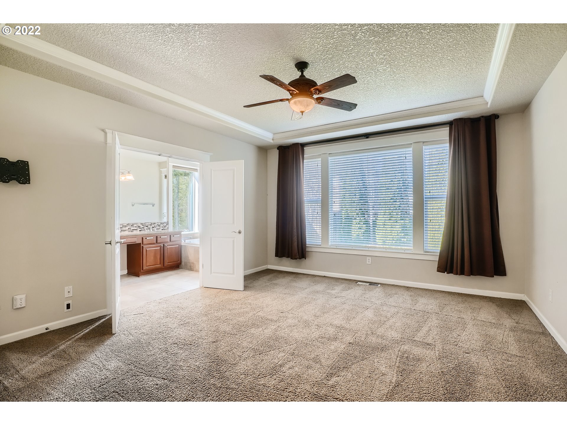 1652 South 15th Way Ridgefield, WA 98642 - Photo 18 of 32 a view of a livingroom with a ceiling fan and window