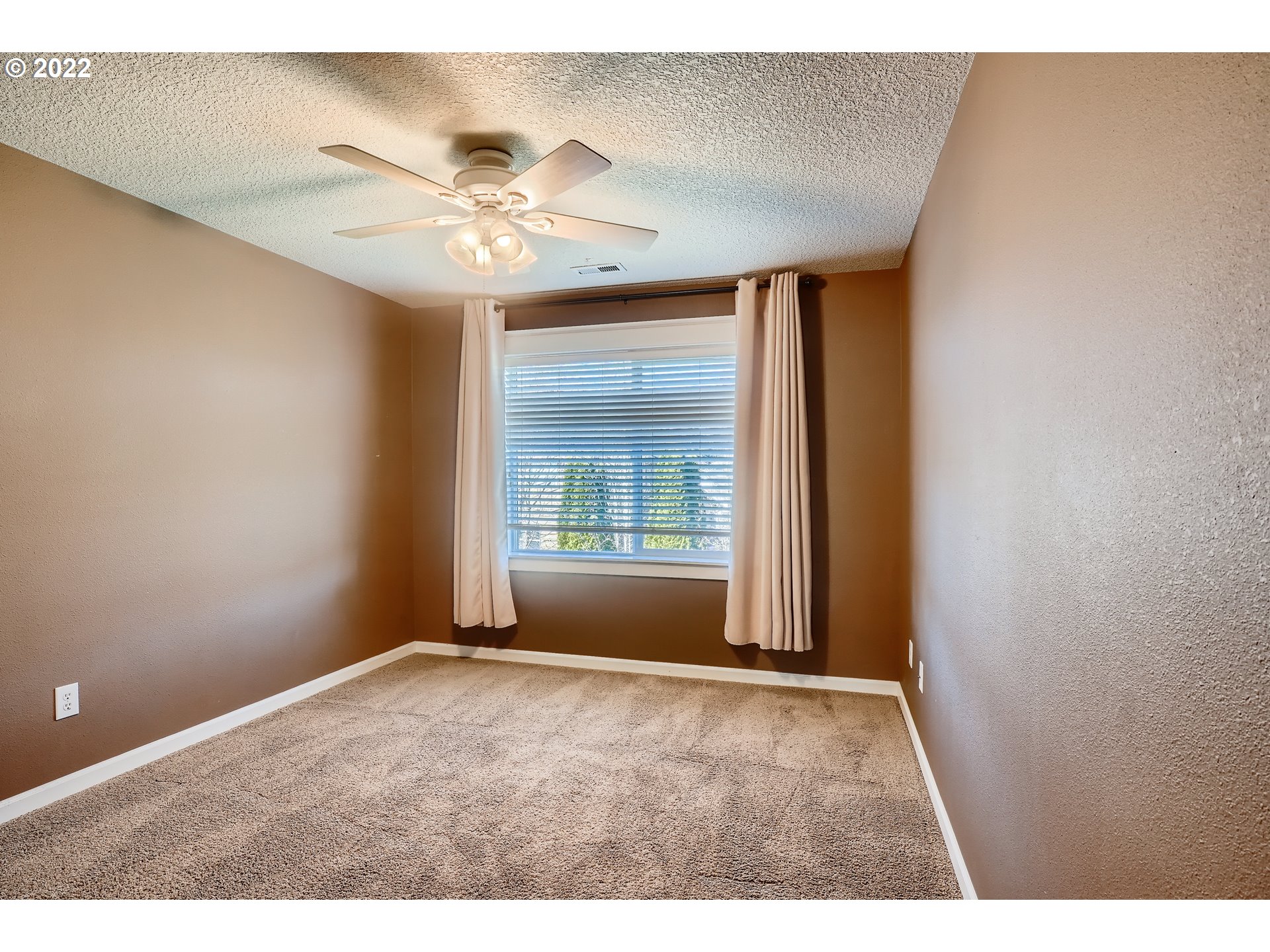 1652 South 15th Way Ridgefield, WA 98642 - Photo 24 of 32 a view of an empty room with a window