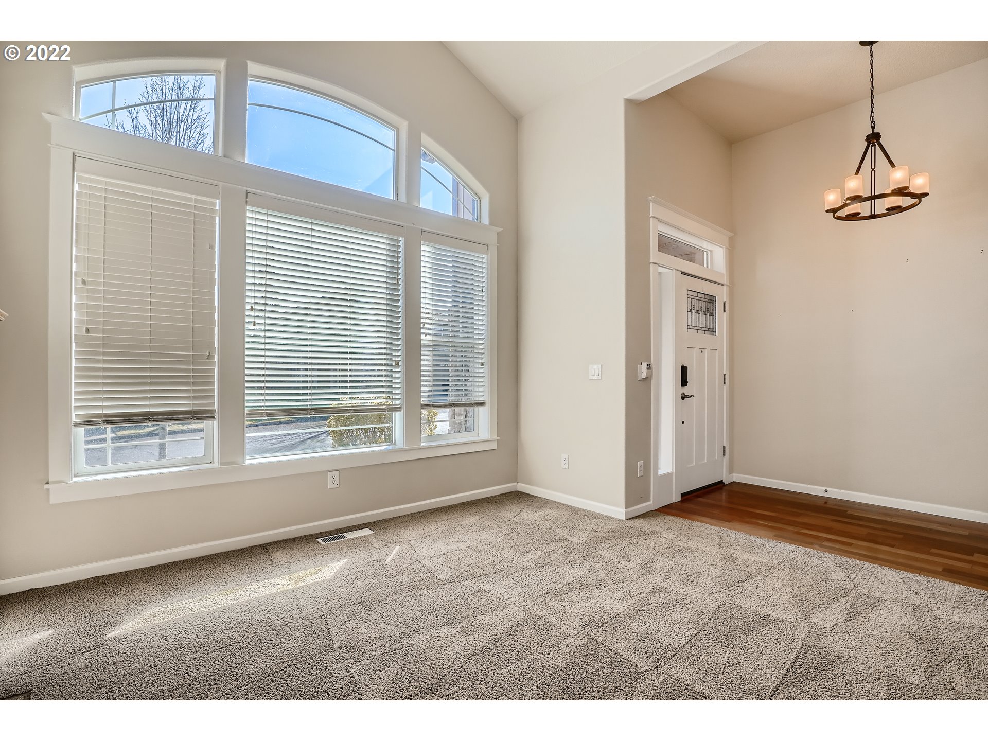 1652 South 15th Way Ridgefield, WA 98642 - Photo 6 of 32 a view of an empty room with a window