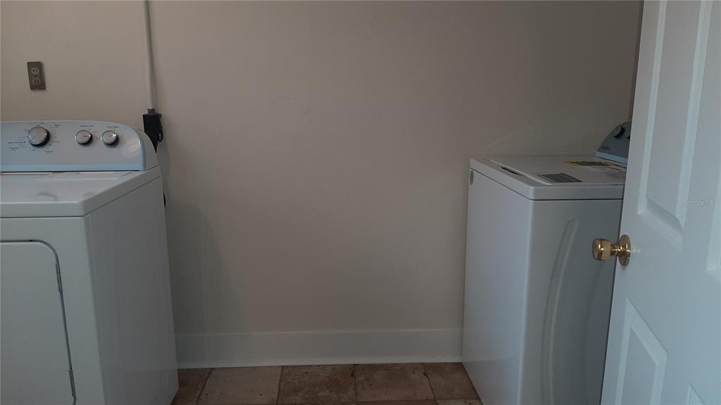 3801 Northwest 6th Street Gainesville, FL 32609 - Photo 16 of 19 a bathroom with a sink and toilet