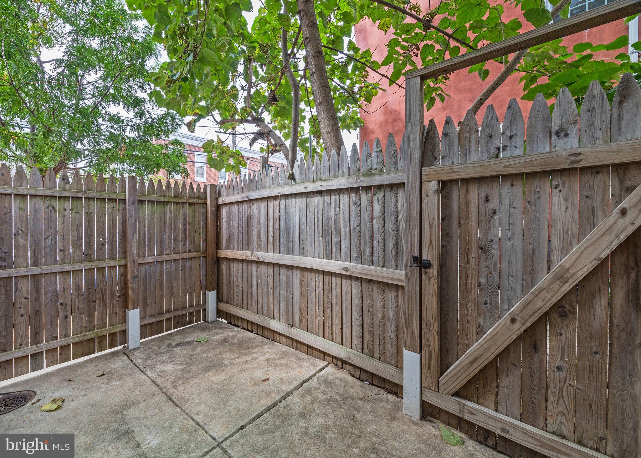 1800 Waterloo Street Philadelphia, PA 19122 - Photo 15 of 47 a view of deck with wooden fence and floor
