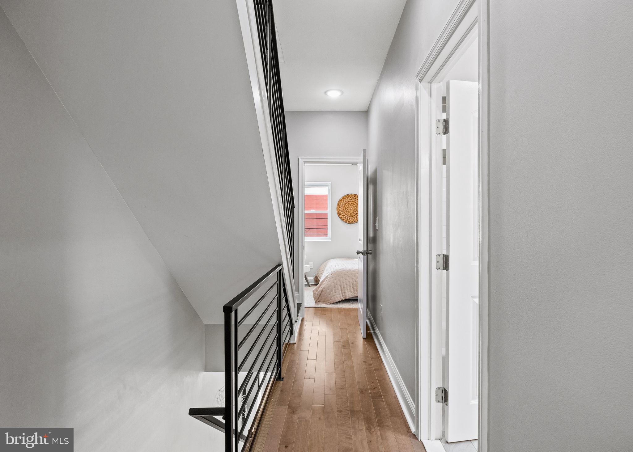 1800 Waterloo Street Philadelphia, PA 19122 - Photo 16 of 47 a view of a hallway with wooden floor
