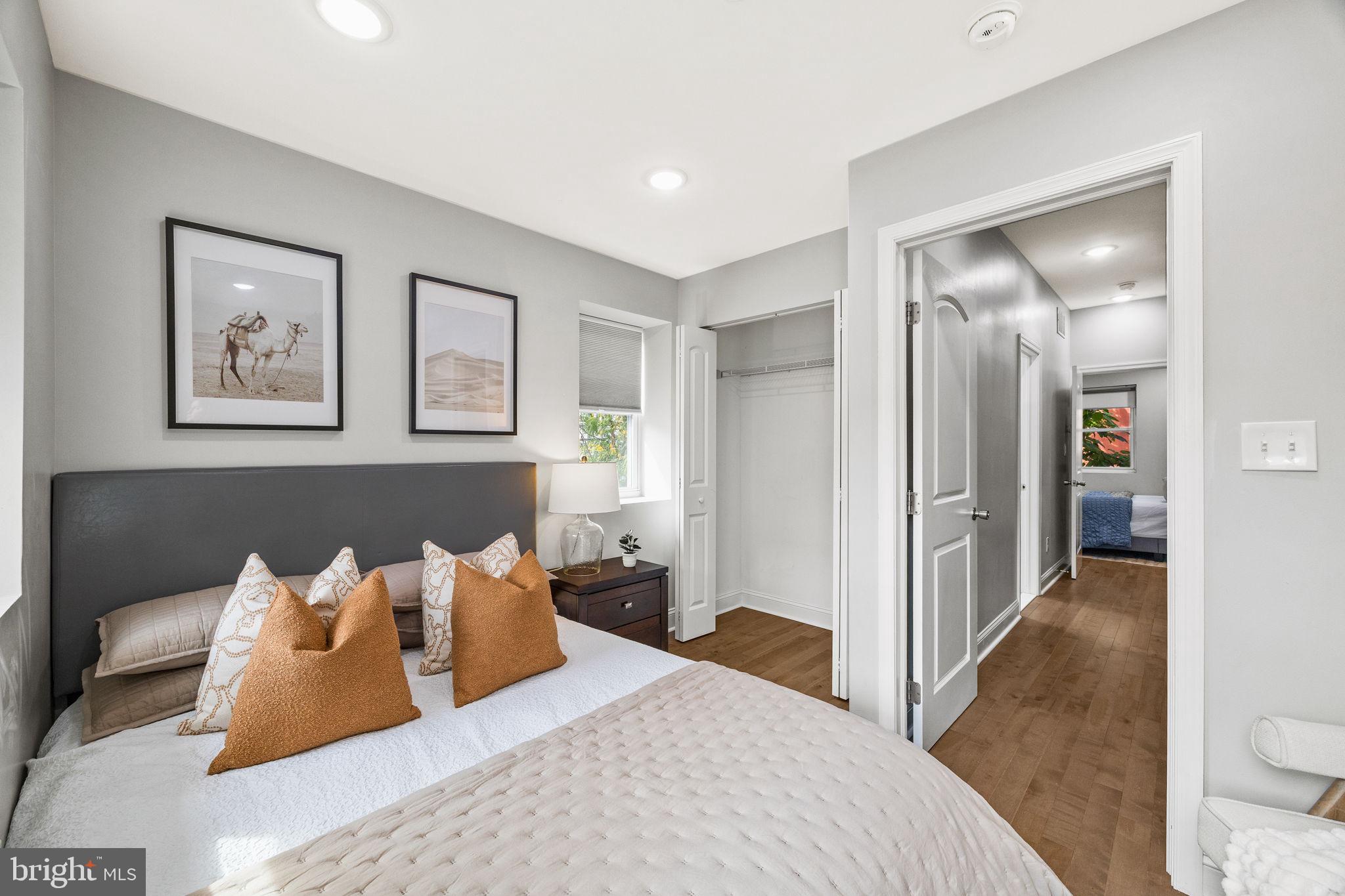 1800 Waterloo Street Philadelphia, PA 19122 - Photo 18 of 47 a bedroom with a bed and a painting on the wall