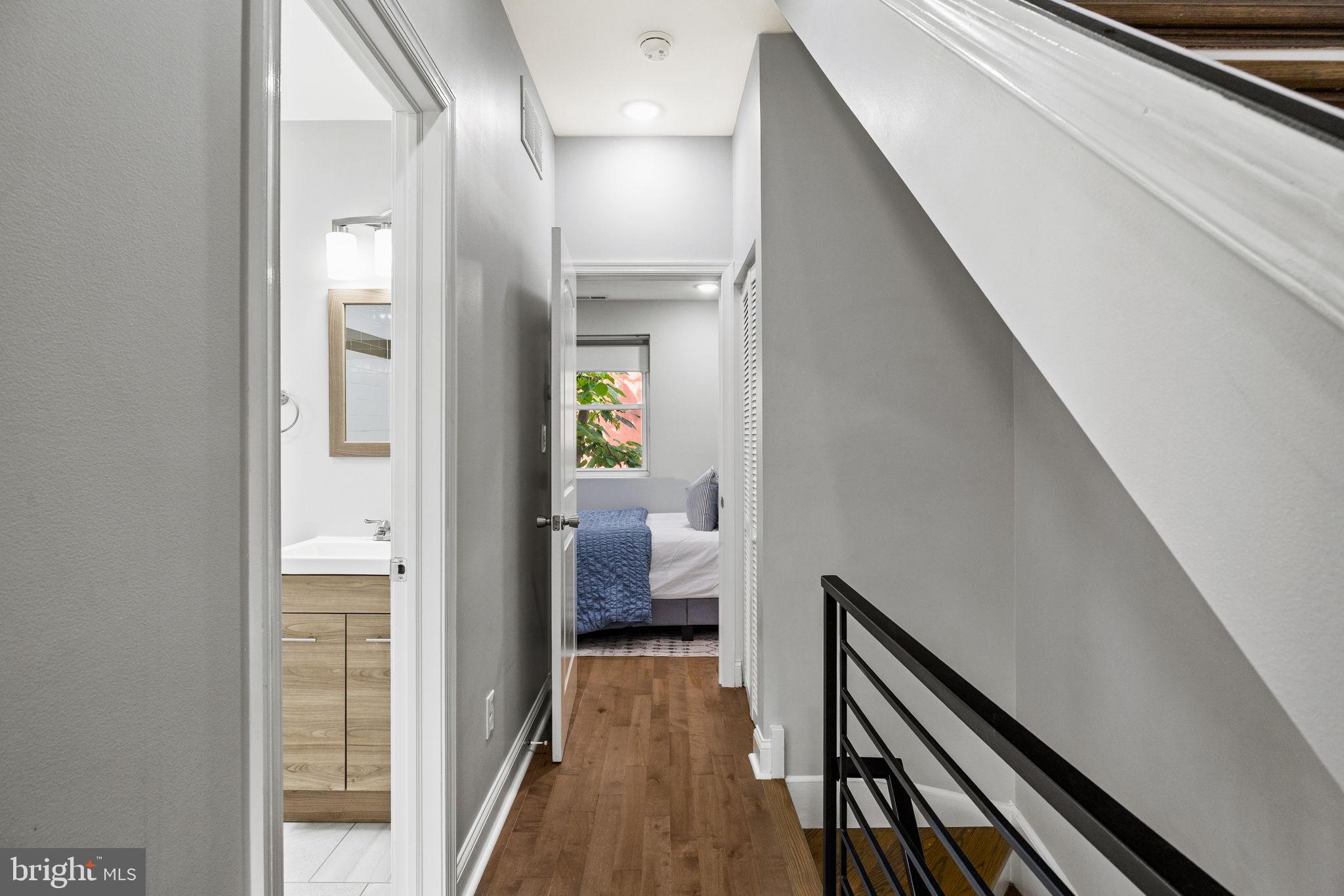 1800 Waterloo Street Philadelphia, PA 19122 - Photo 20 of 47 a view of a hallway with wooden floor and staircase
