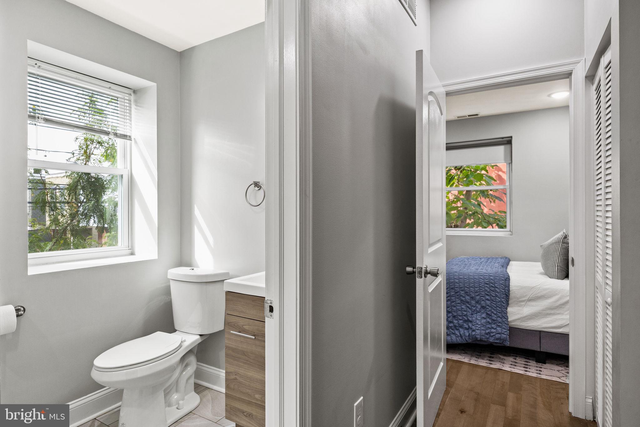 1800 Waterloo Street Philadelphia, PA 19122 - Photo 21 of 47 a bathroom with a toilet and a shower