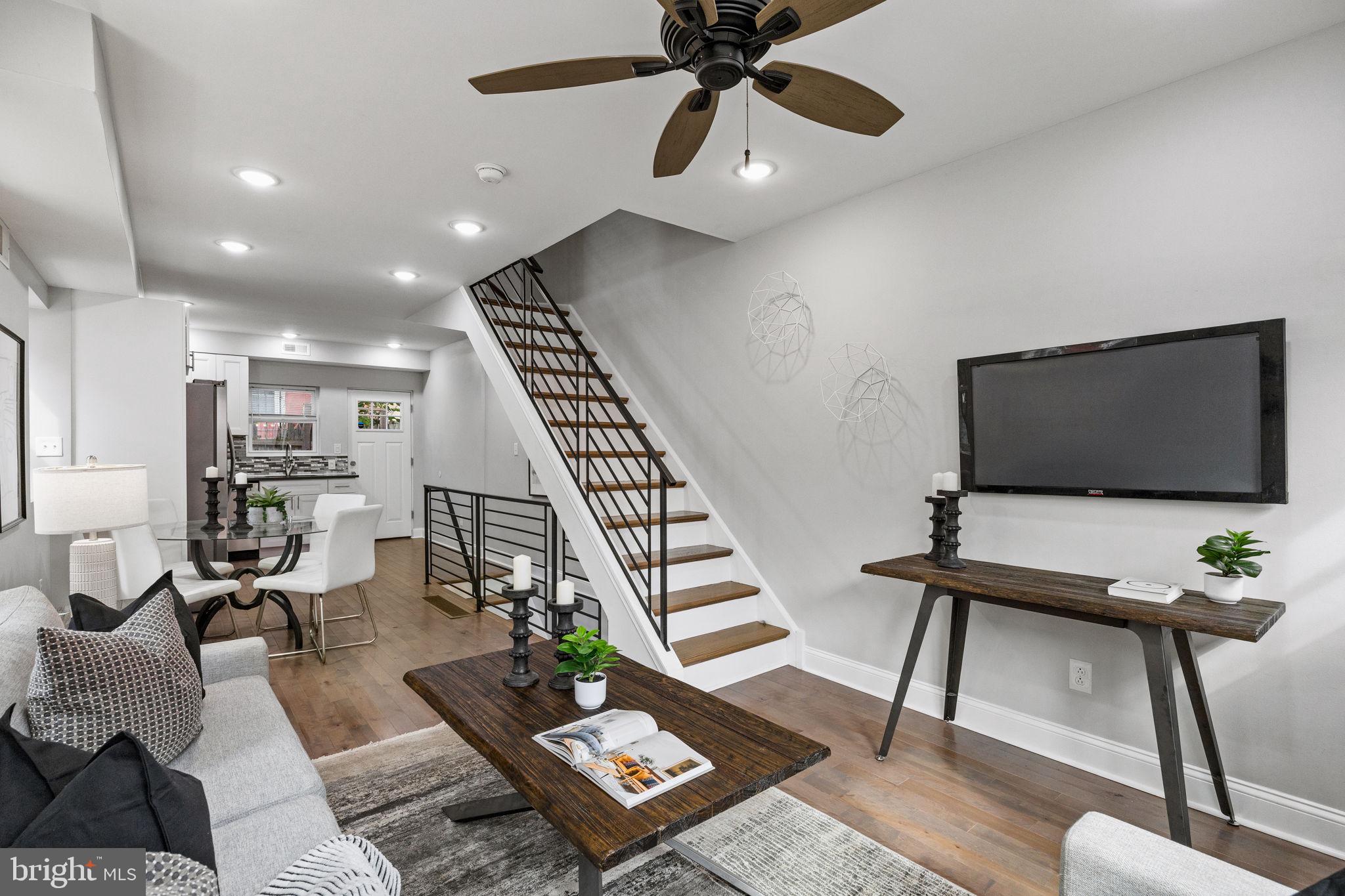 1800 Waterloo Street Philadelphia, PA 19122 - Photo 6 of 47 a living room with furniture and a flat screen tv