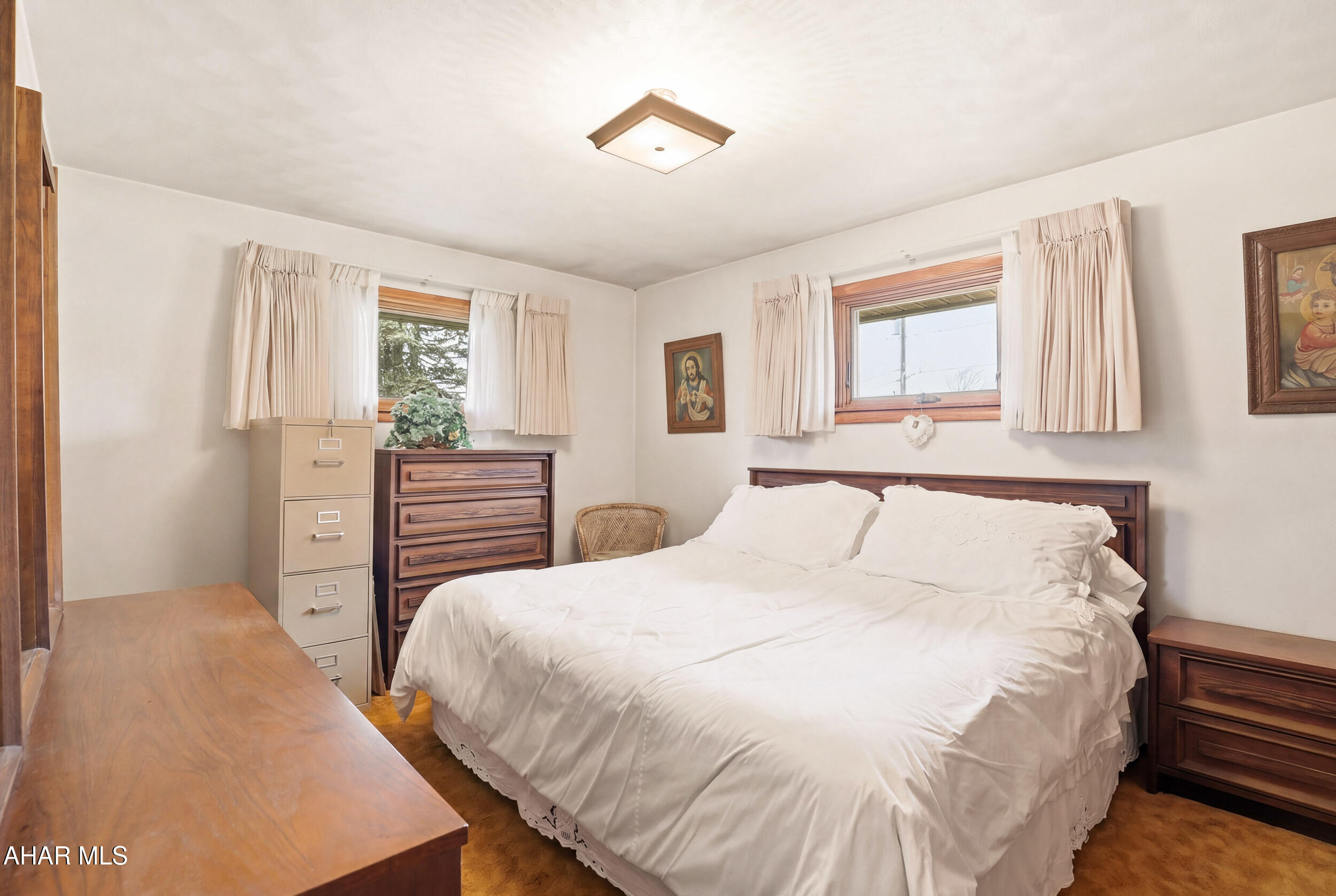 506 Ruby Street Windber, PA 15963 - Photo 22 of 38 a bedroom with a bed and a window