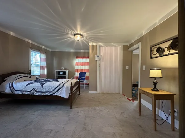 a workspace with furniture and a window