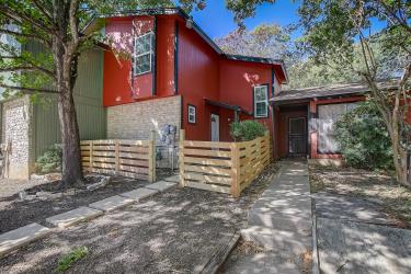 6906 Lovely Lane Austin, TX 78744 - Photo 1 of 20 a view of a house with a yard
