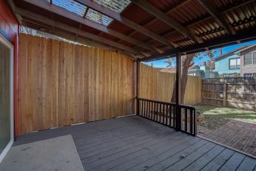 6906 Lovely Lane Austin, TX 78744 - Photo 17 of 20 a view of backyard with porch