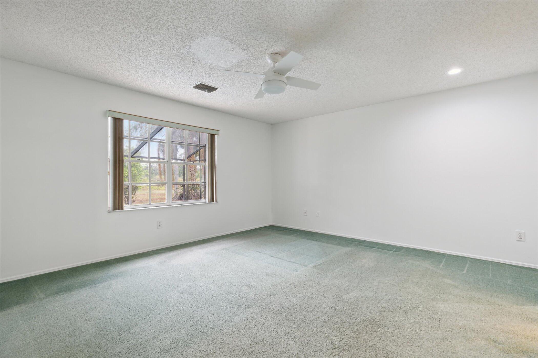 1270 Meadowbrook Road Northeast Palm Bay, FL 32905 - Photo 26 of 58 Primary Bedroom