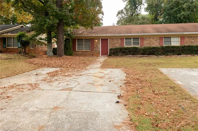 a picture of a book and a white wall
