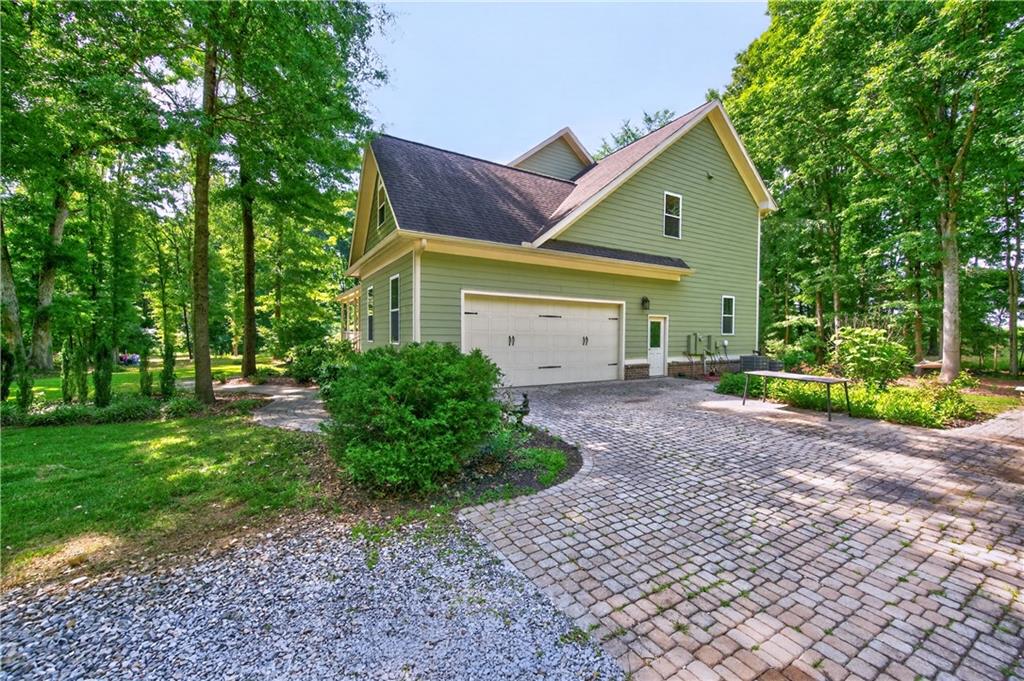 632 Geiger Road Jefferson, GA 30549 - Photo 54 of 55 a front view of a house with garden