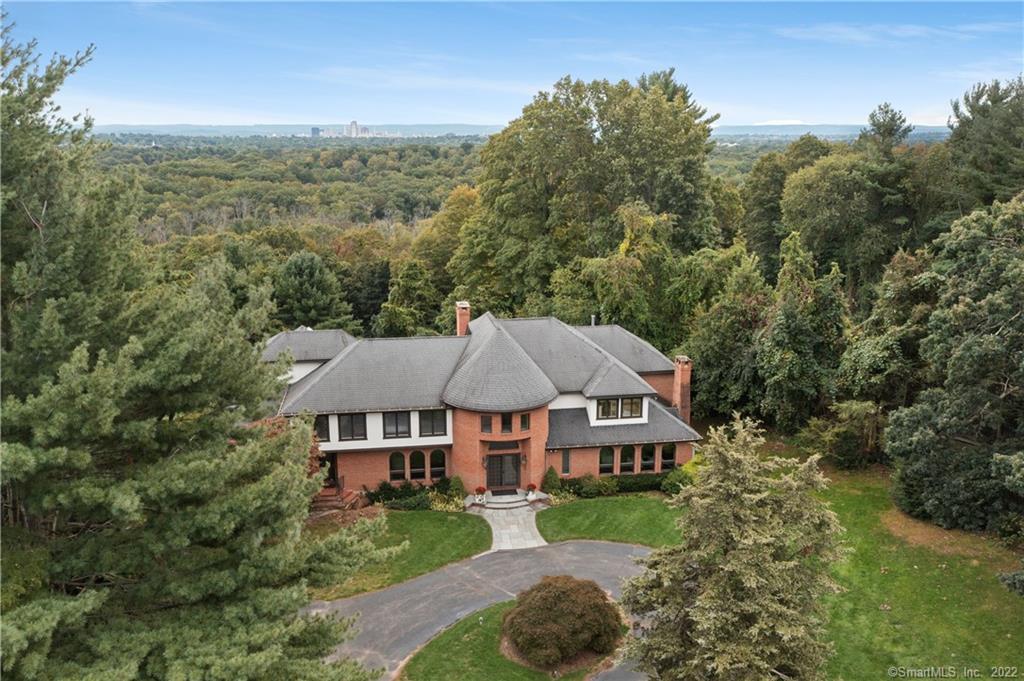 Beautiful Brick and Stucco Contemporary Colonial with Hartford Skyline Views in the Distance.