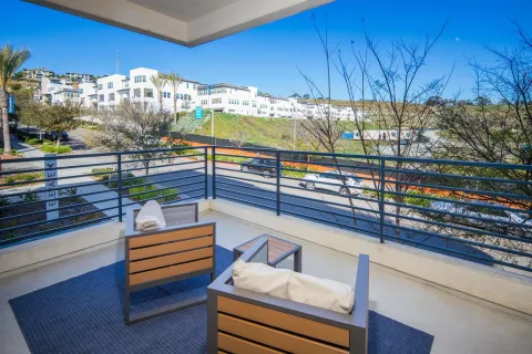 a view of a chairs and table on the terrace