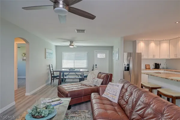 a living room with furniture and a table