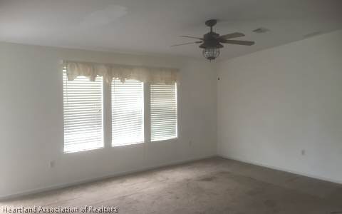 4328 Skipper Road Sebring, FL 33875 - Photo 4 of 8 a view of an empty room with a window