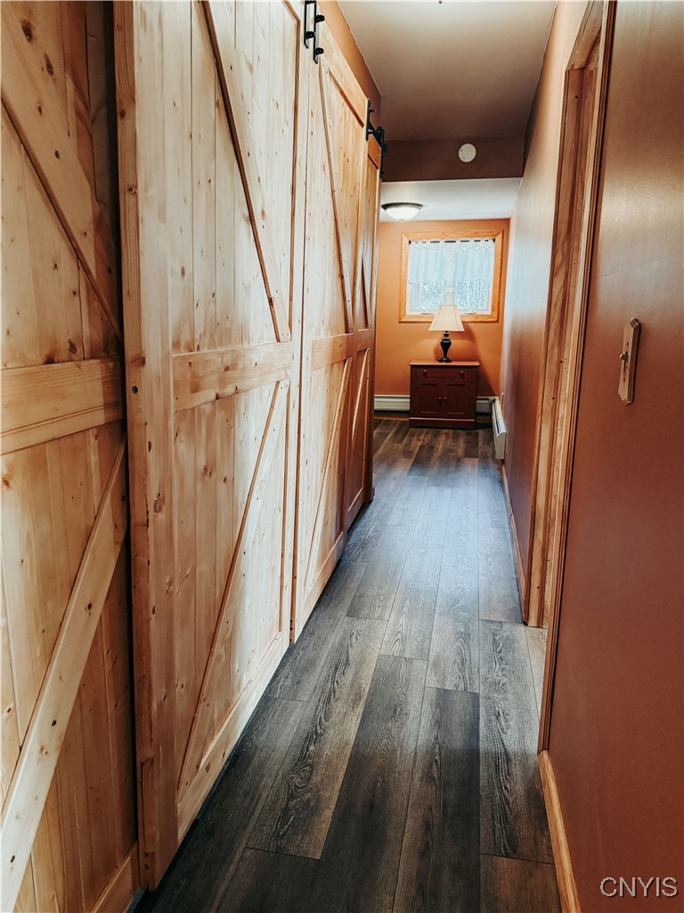 87 Armstrong Road Lansing, NY 14882 - Photo 19 of 49 Hall to Two Bedrooms, Bath, and Laundry Area