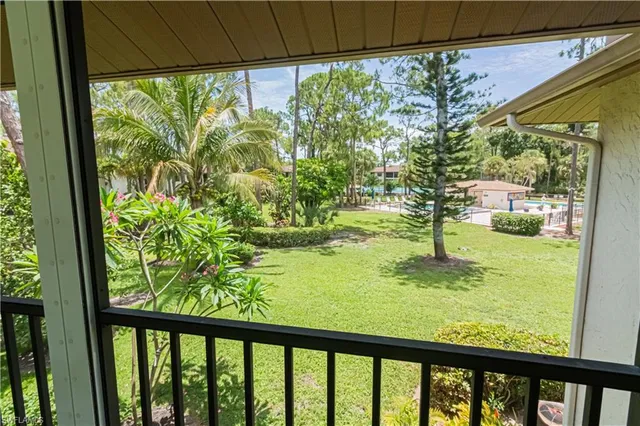 a view of swimming pool from a window