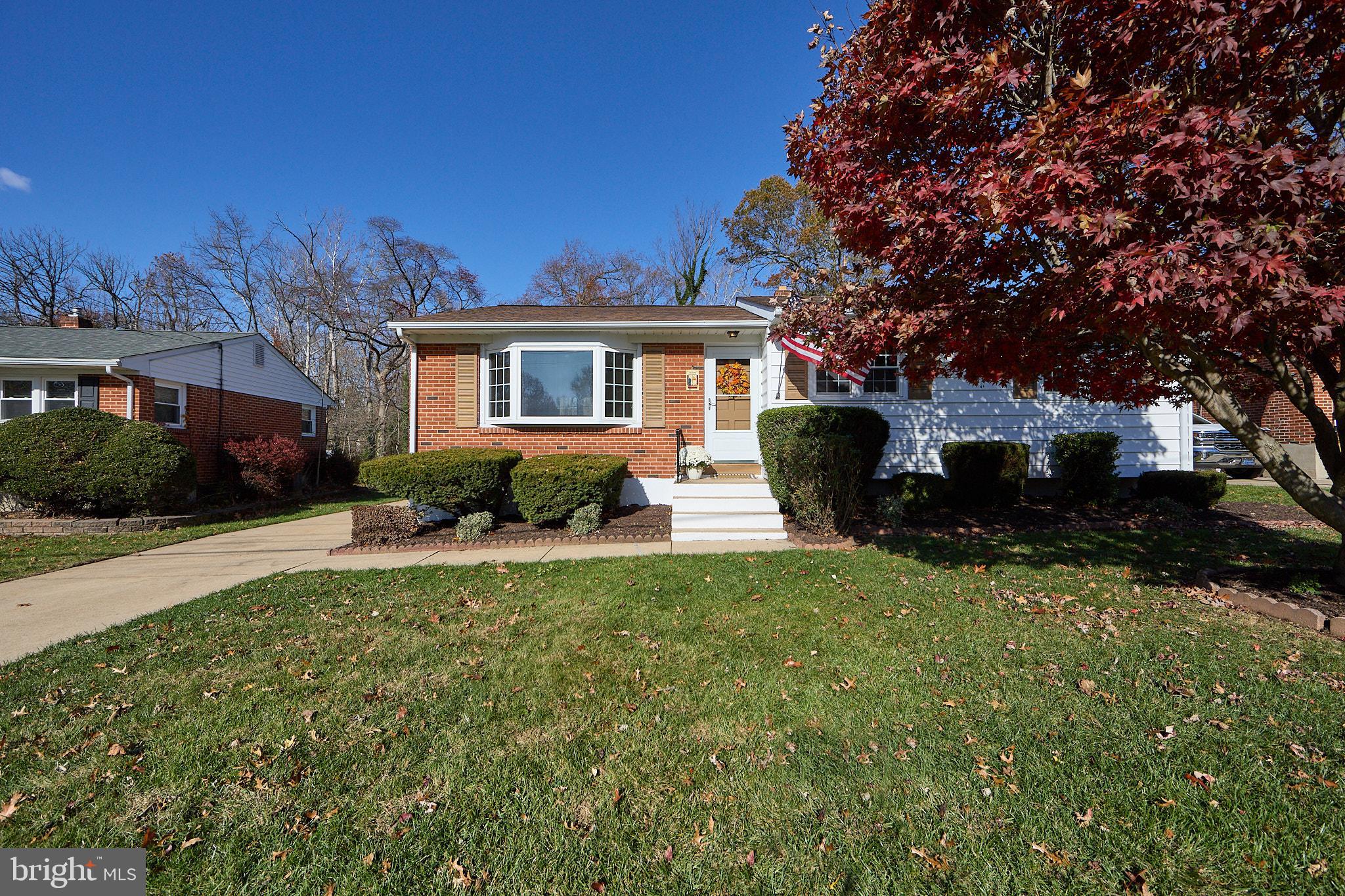 914 Quail Lane Newark, DE 19711 - Photo 2 of 27 Charming brick home with lush landscaping.