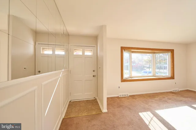 an empty room with windows