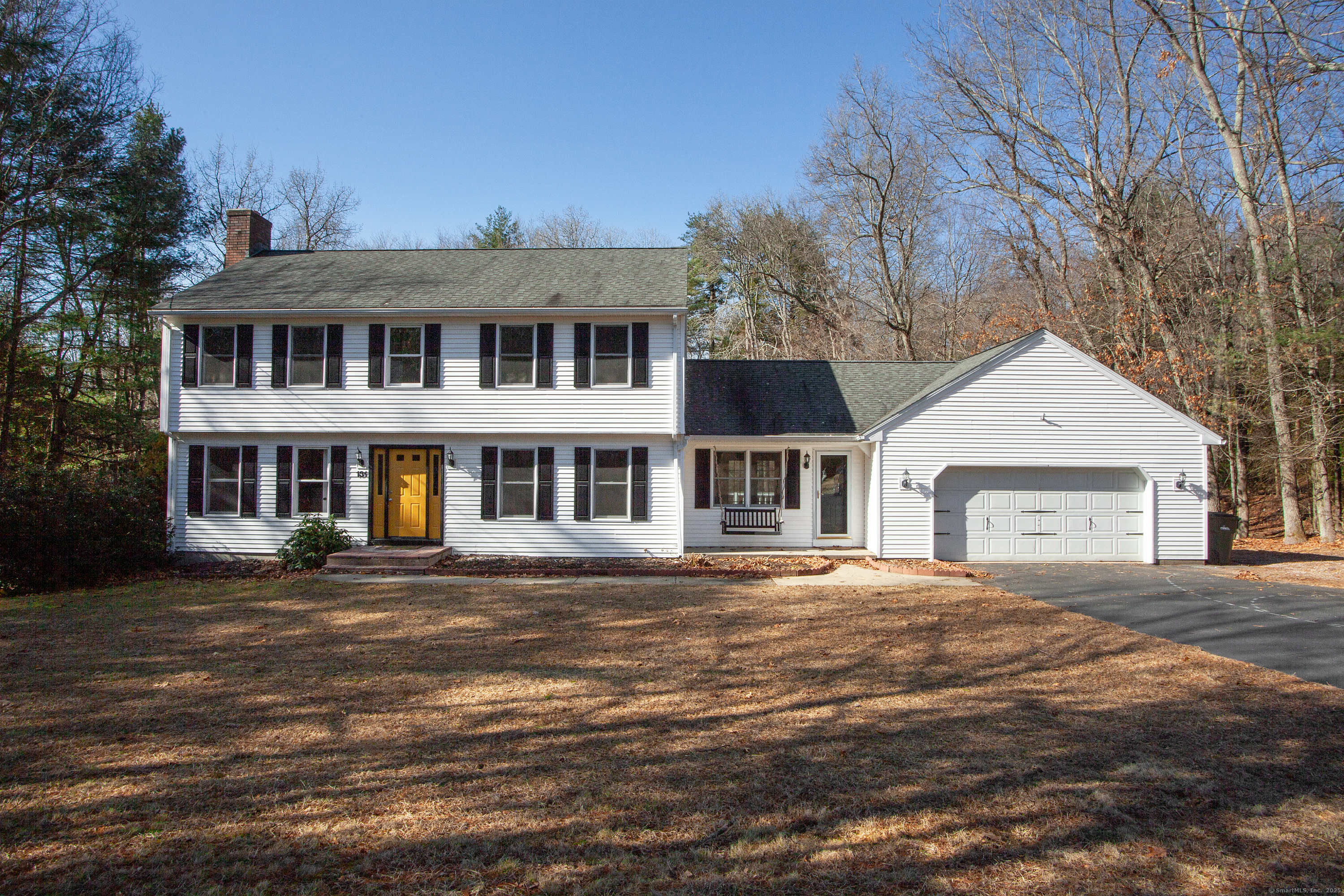 131 Notch Road Granby, CT 06035 - Photo 1 of 1 a front view of a house with a garden