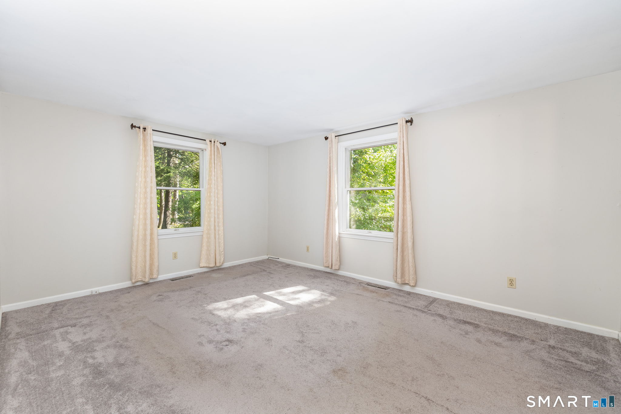 347 Griffin Road Suffield, CT 06093 - Photo 12 of 35 an empty room with windows