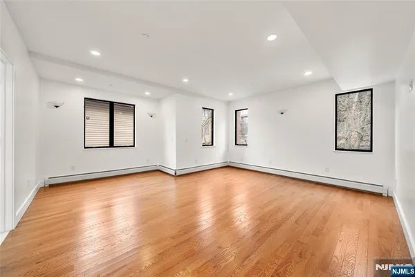a view of entryway with wooden floor