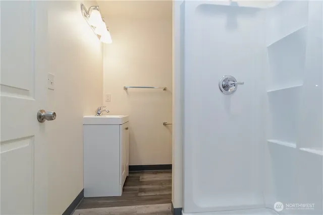 a bathroom with a sink and toilet