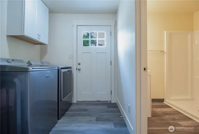 a view of a kitchen from the hallway