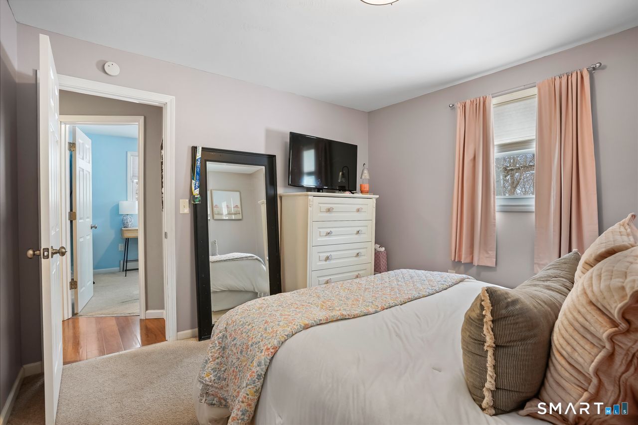 17 Forest View Drive Wolcott, CT 06716 - Photo 26 of 33 a bedroom with a bed and a television