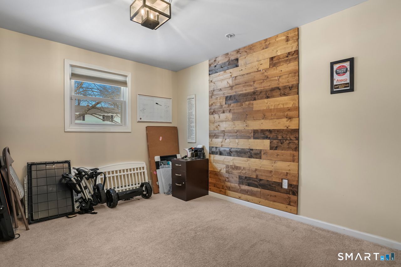 17 Forest View Drive Wolcott, CT 06716 - Photo 27 of 33 a view of workspace with lounge chair and windows