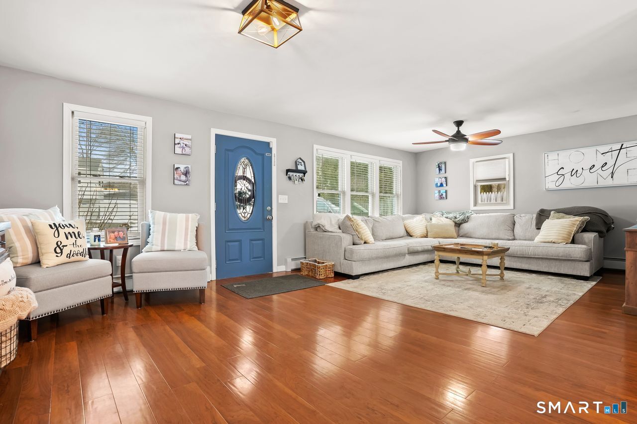 17 Forest View Drive Wolcott, CT 06716 - Photo 3 of 33 a living room with furniture and a couch