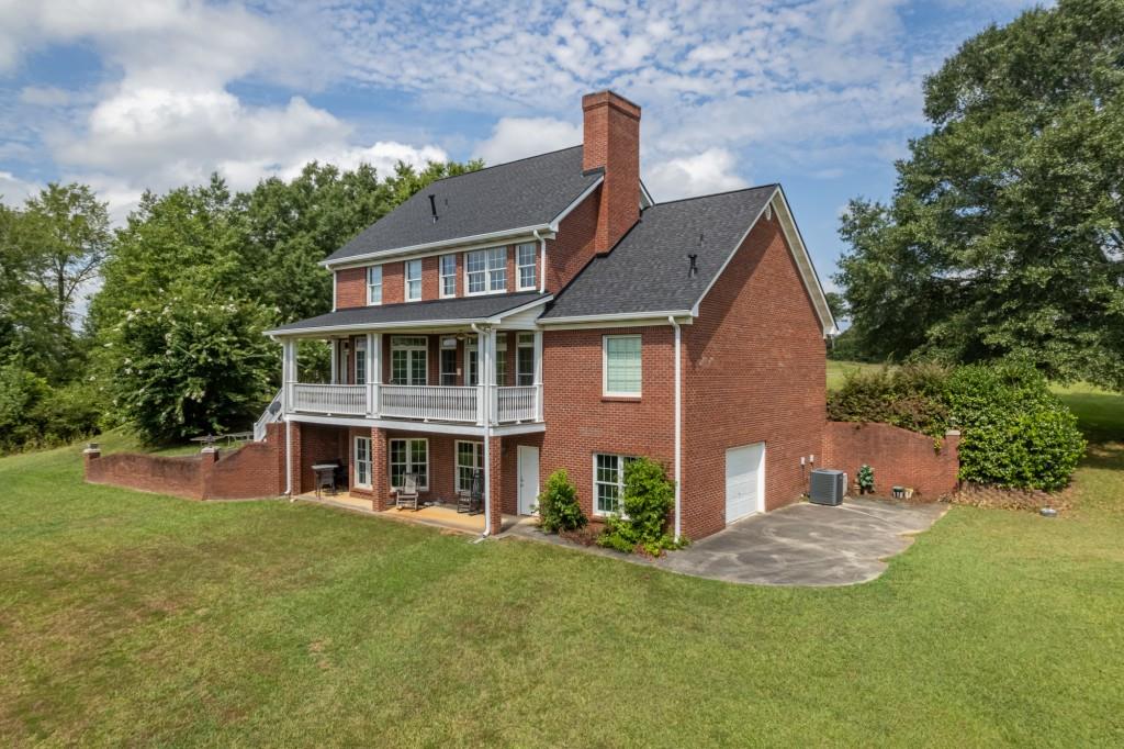 865 Morgan Valley Road Rockmart, GA 30153 - Photo 2 of 30 a front view of a house with a yard