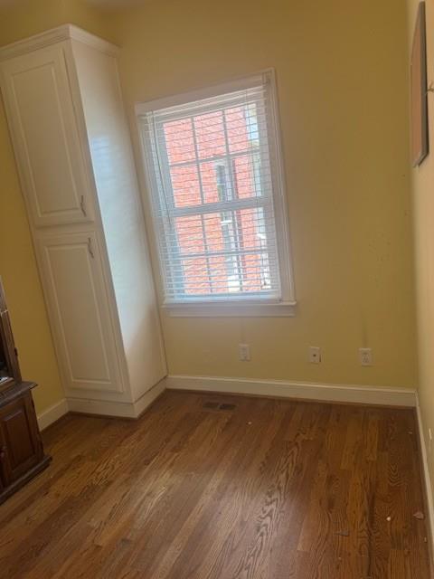 865 Morgan Valley Road Rockmart, GA 30153 - Photo 23 of 30 an empty room with wooden floor and windows