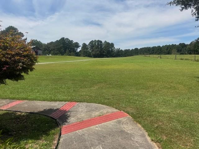865 Morgan Valley Road Rockmart, GA 30153 - Photo 28 of 30 a view of a lake with a big yard