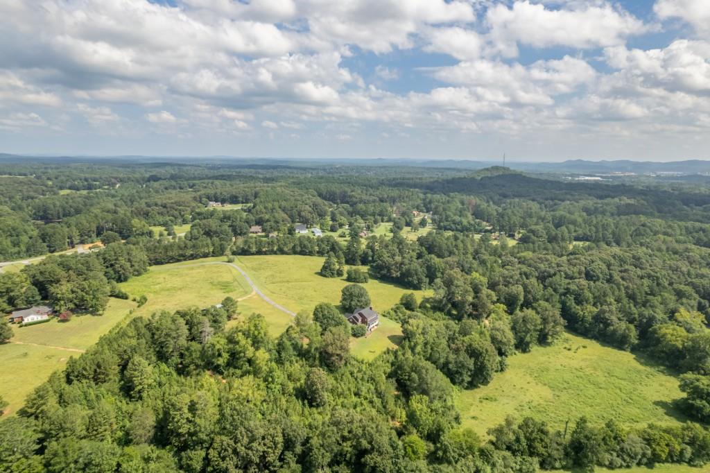 865 Morgan Valley Road Rockmart, GA 30153 - Photo 5 of 30 a view of a yard with swimming pool and mountains