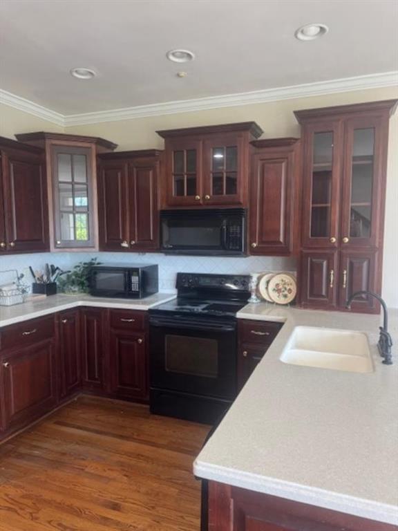 865 Morgan Valley Road Rockmart, GA 30153 - Photo 10 of 30 a kitchen with stainless steel appliances granite countertop a sink and wooden cabinets