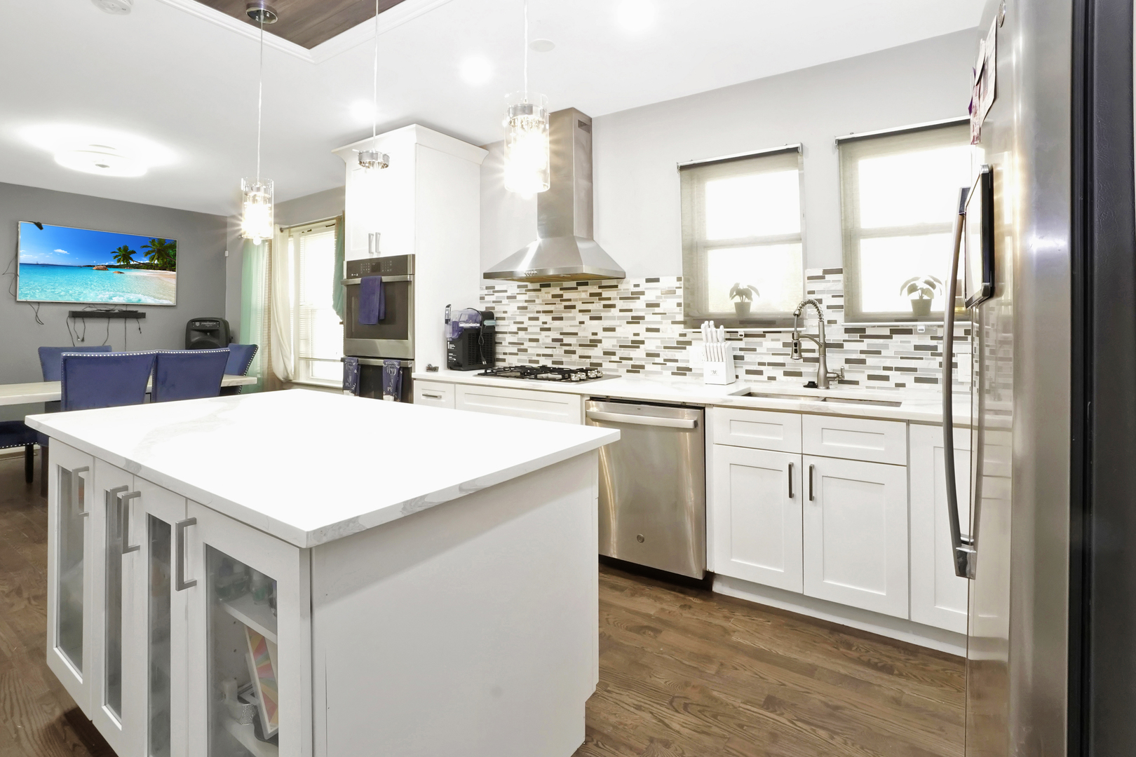 7801 South Ada Street Chicago, IL 60620 - Photo 6 of 7 a kitchen with a stove a sink and a refrigerator