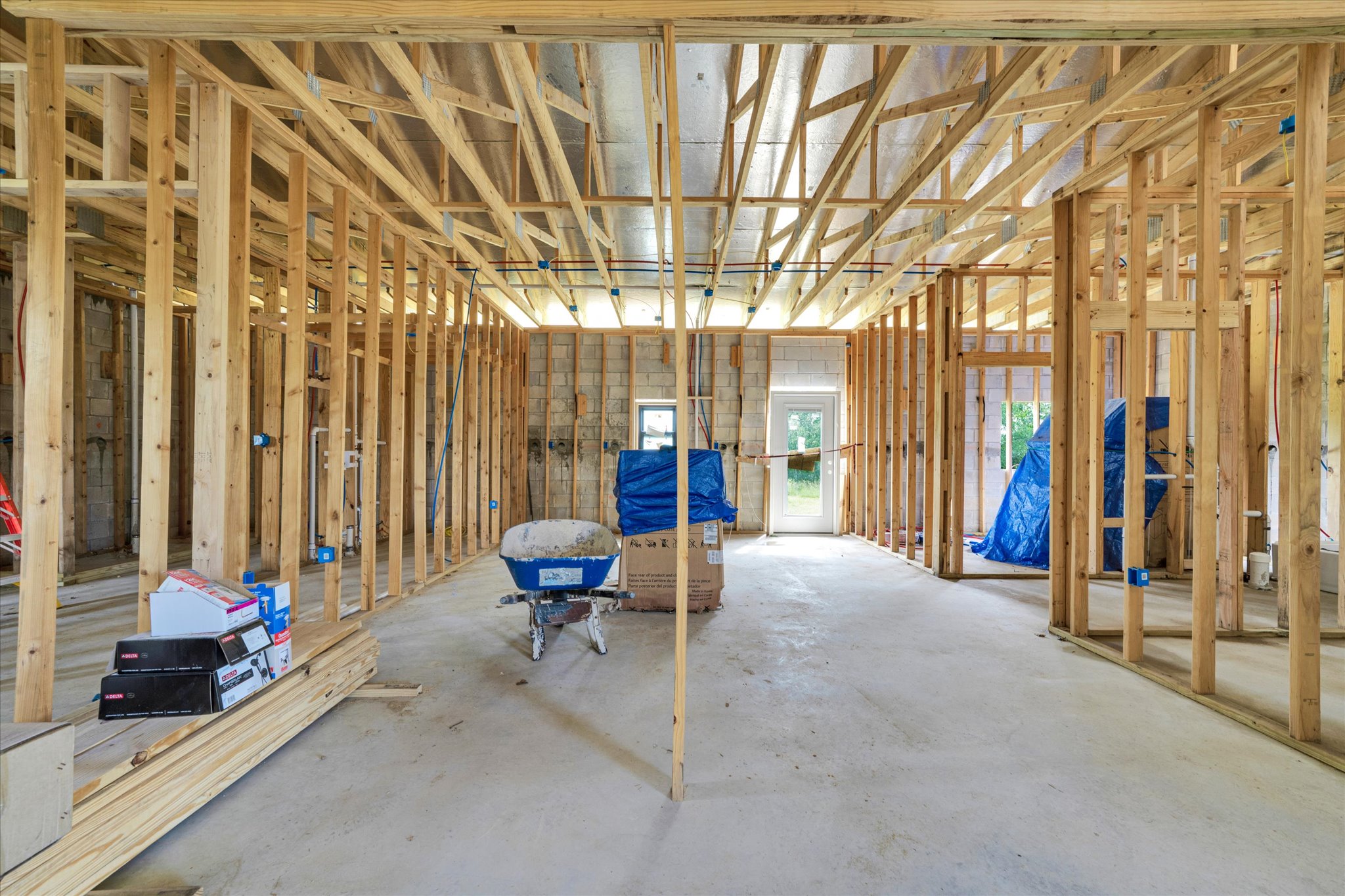 2755 Washburn Road Luling, TX 78648 - Photo 25 of 40 Witness the meticulous framing of a new residence, showcasing structural integrity.