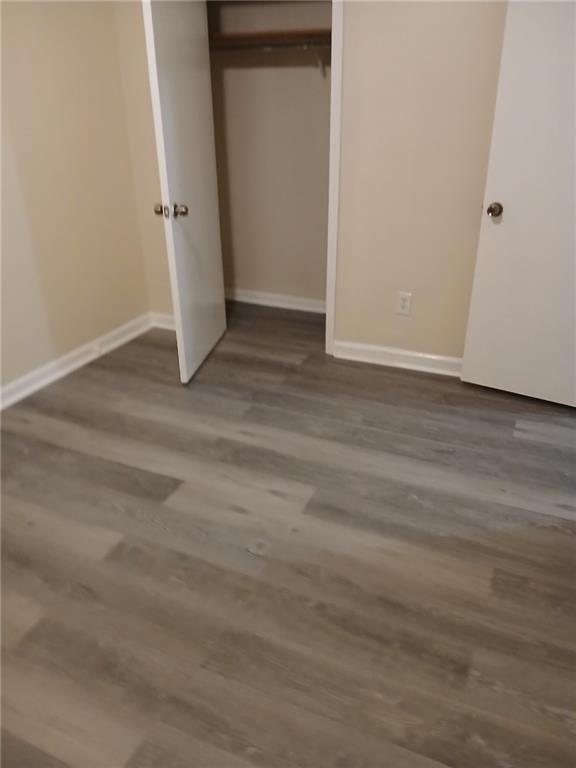 39 Hannon Way, Unit 2 Cartersville, GA 30120 - Photo 3 of 5 an empty room with wooden floor