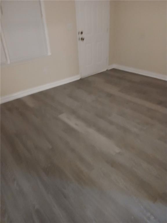39 Hannon Way, Unit 2 Cartersville, GA 30120 - Photo 4 of 5 an empty room with wooden floor