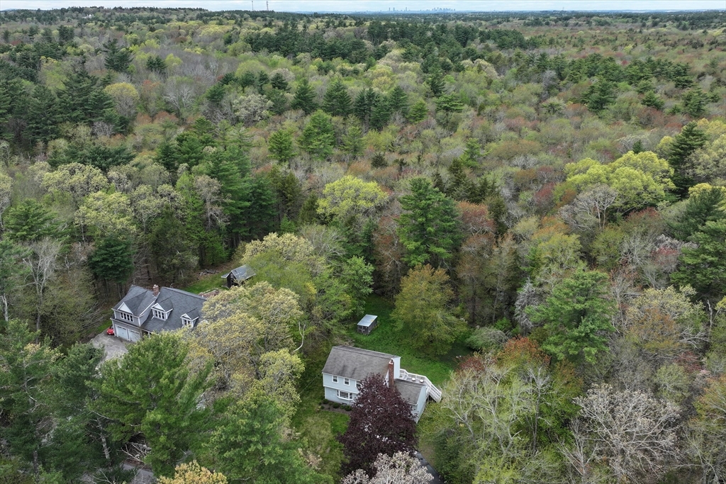 59 First Parish Road Norwell, MA 02061 - Photo 33 of 37 an aerial view of a house with a yard