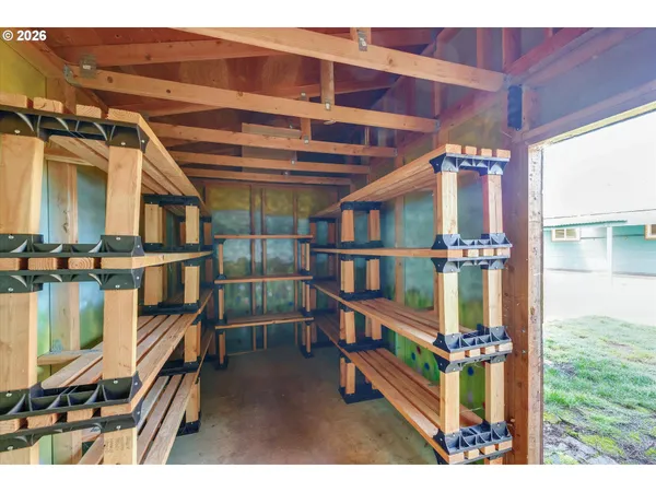 a view of staircase with a white walls