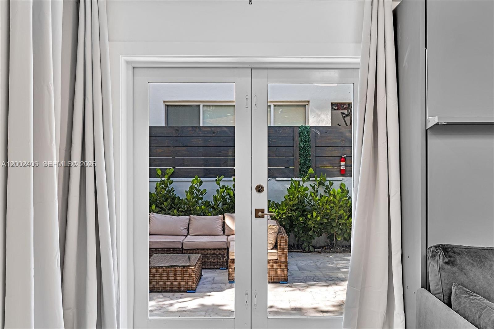 1002 10th Street, Unit 1002 Miami Beach, FL 33139 - Photo 35 of 71 a view of a door front of a house