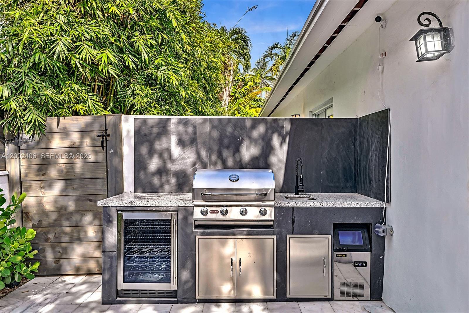 1002 10th Street, Unit 1002 Miami Beach, FL 33139 - Photo 42 of 71 a stove top oven sitting inside of a kitchen